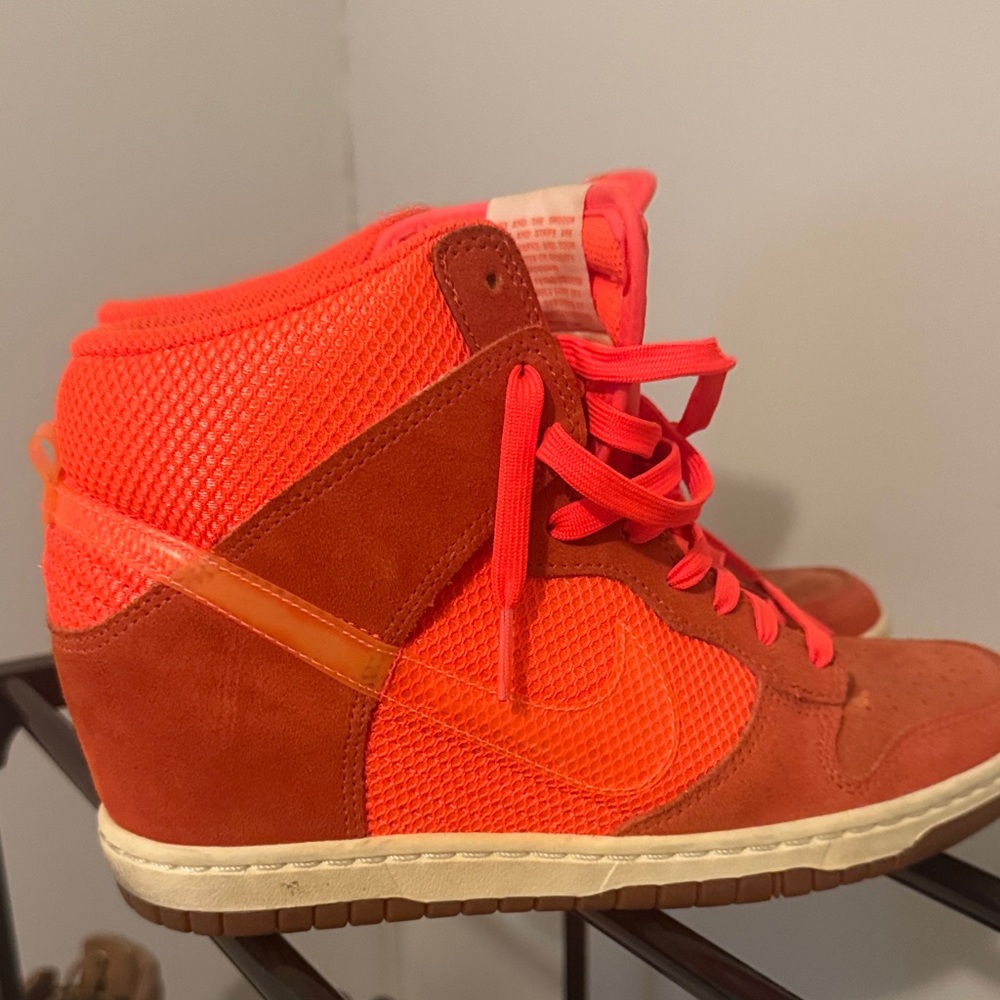 Nike Women’s High-Top Wedge Sneaker in Bright Orange and Rust